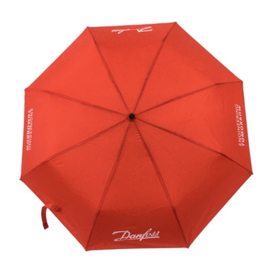 Handbuch offen über dem Druck von roten Falten des Regenschirm-3